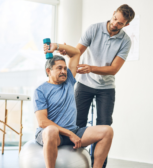 Physiotherapist treating a patient at Carewell